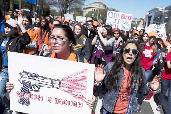 Students at Roosevelt High School take part in a protest against gun violence, March 2018, in Seattle