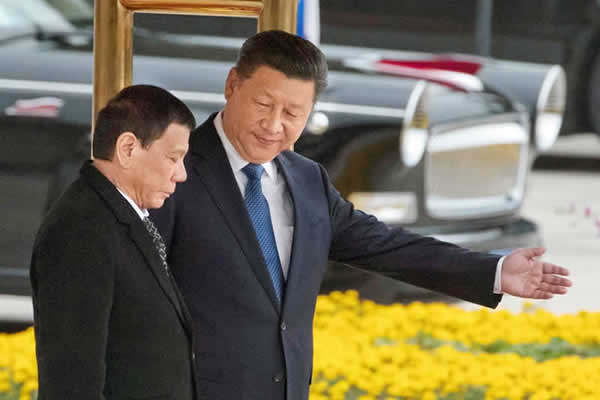 Presidents Xi Jinping and Rodrigo Duterte during a welcome ceremony outside the Great Hall of the People in Beijing, China, Oct., 2016