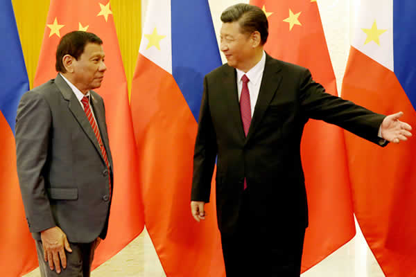 Duterte met with Xi Jinping in 2018, where he avoided the subject of the West Philippine Sea